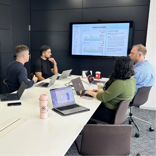 MG SEO team meeting with Tenga client reviewing Google core update
