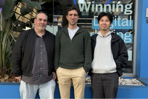 Three members of the Online Marketing Gurus web design and development team standing together