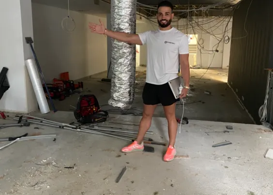 Andrew Raso inside the Singapore office fit-out ahead of opening, 2021