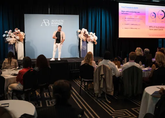 Saf presenting at the Aesthetic Business Masters summit, 2026