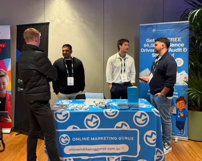OMG team at the Online Marketing Gurus stand at Generate Summit