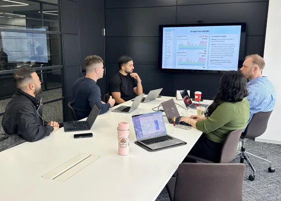 OMG team presenting strategic recommendations in a client meeting room