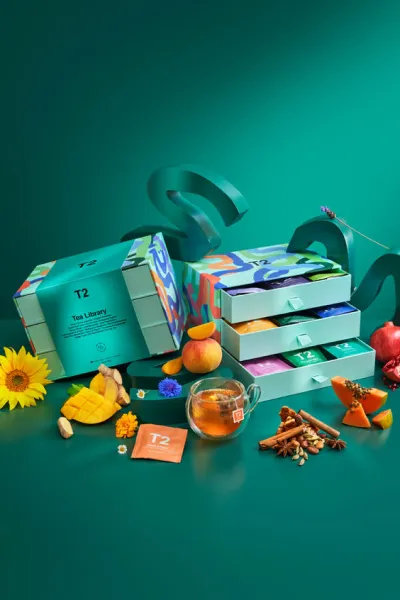 T2 Tea Library social ad showcasing the gift box range surrounded by fresh fruit, spices and florals