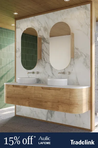 Tradelink social ad promoting 15% off Aulic Lafeme bathroom vanities featuring an oak double vanity with marble backdrop
