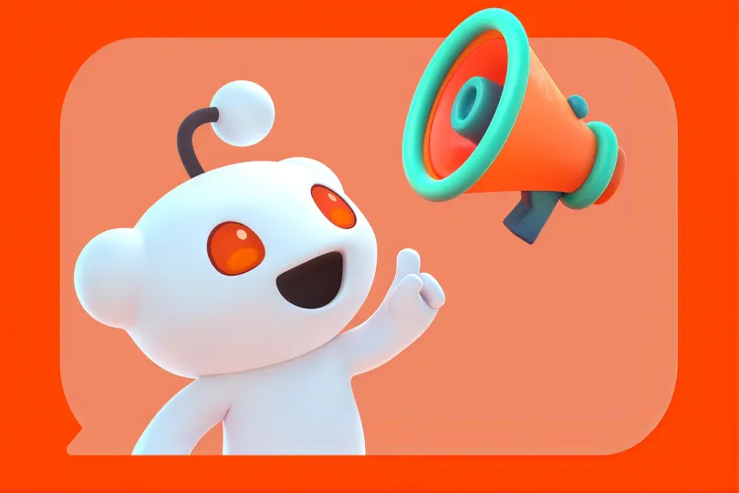 3D Reddit mascot beside a megaphone on a speech bubble background