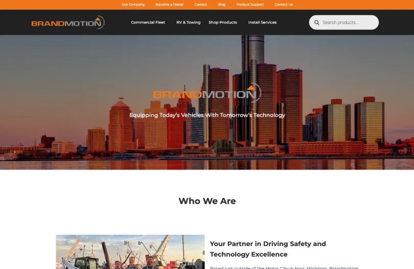 Brandmotion website homepage showing the Detroit skyline and vehicle technology navigation