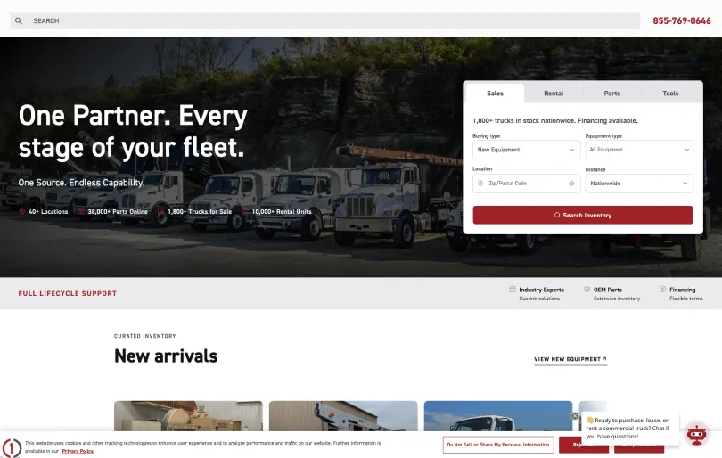 Custom Truck One Source homepage showing the inventory search tool and fleet hero banner