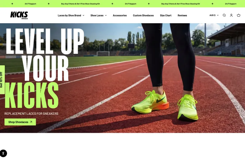 Kicks Shoelaces homepage with the Level Up Your Kicks banner showing running shoes on a track, and navigation for laces by shoe brand and custom shoelaces